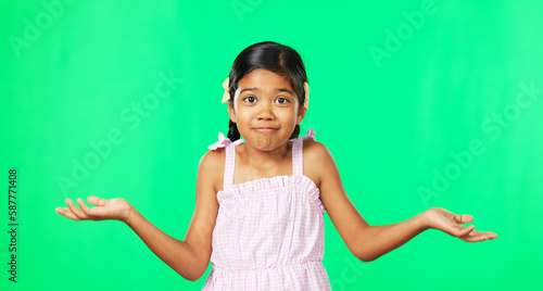 Fotografie Portrait, happy and a girl shrugging on a green screen background in studio to gesture doubt or whatever