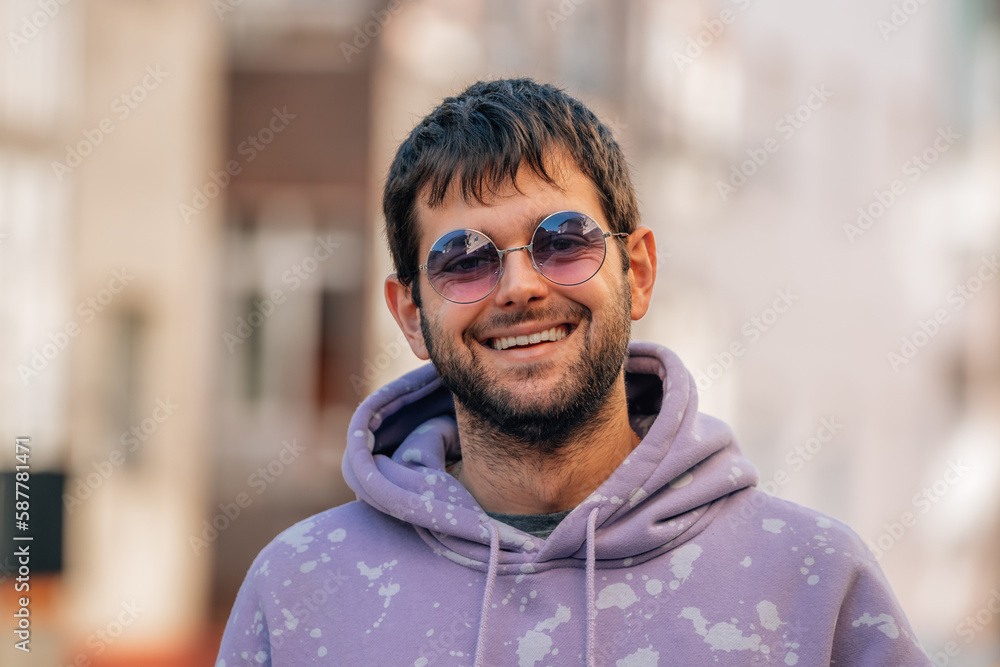 portrait of young man with sunglasses and beard outdoors portrait of young man with sunglasses and beard outdoors