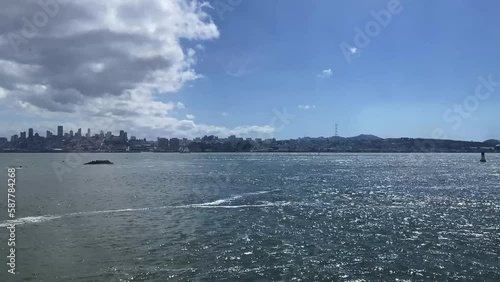 Approaching Alcatraz Island, with the San Francisco skyline in the background,as seen from the San Francisco Bay on a beautiful, sunny day.