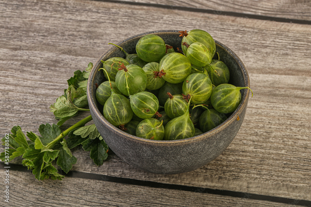 Natural ripe gooseberry heap in the bowl Natural ripe gooseberry heap in the bowl