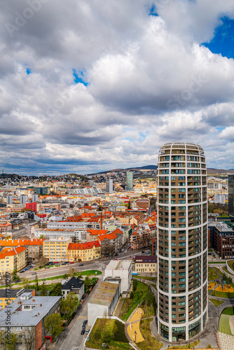 Photography Bratislava city skyline, modern buildings, and traditional houses with red roof