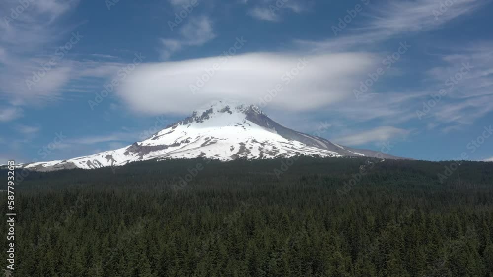 Lenticular clouds over Mt. Hood on a warm summer day in Oregon. Lenticular clouds over Mt. Hood on a warm summer day in Oregon.