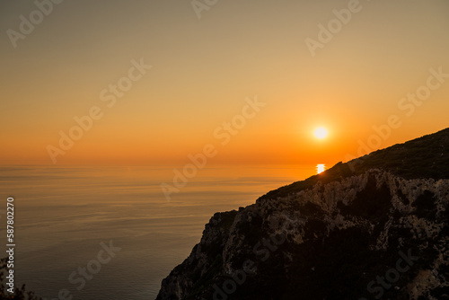 Amazing sunset seen from Angelokastro hill, Corfu, Greece