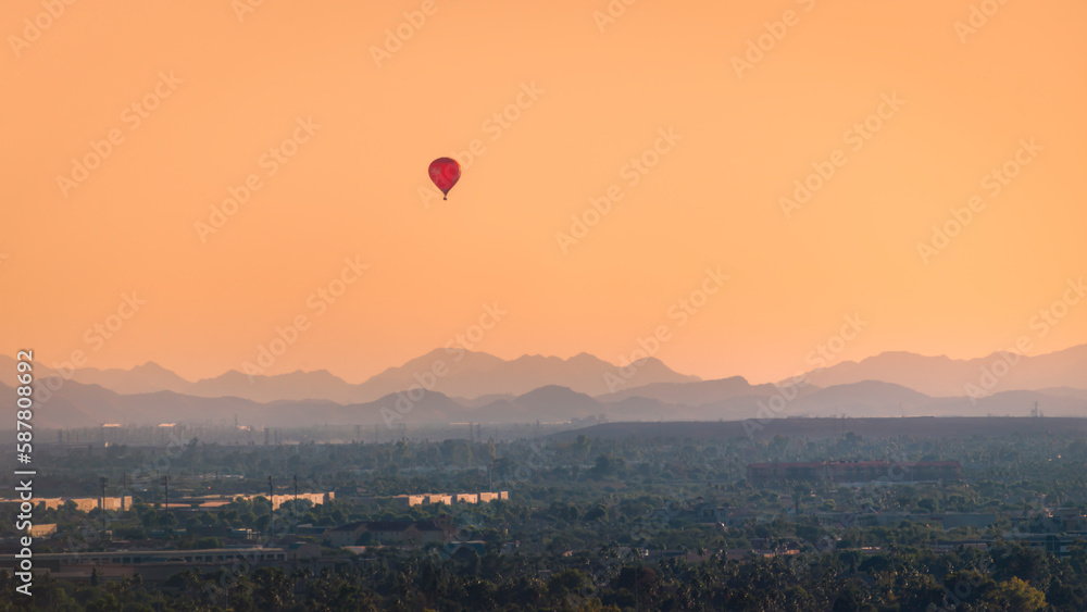 Hot air balloon over Phoenix desert @ Sunset Hot air balloon over Phoenix desert @ Sunset