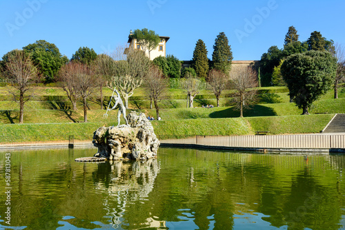 Fountain of Neptune. Boboli Gardens. Florence. Italy. Statue of Neptune with a trident. City park in Florence