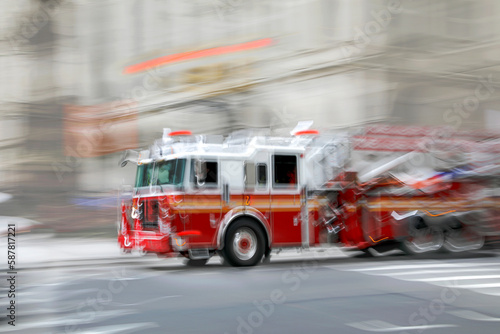 fire trucks and firefighters brigade in the city