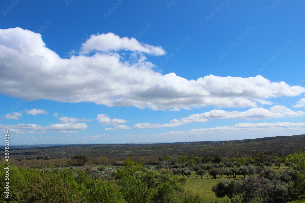 blue sky and clouds over the outsides of Madrid, Spain