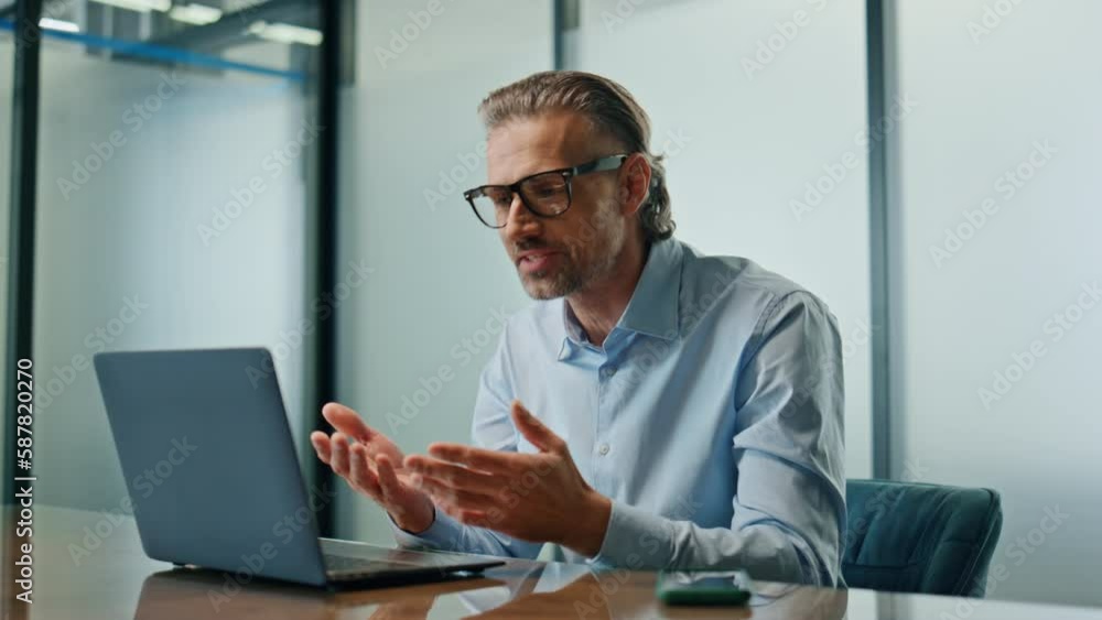 Nervous director talking computer work room close up. Angry man gesturing hands Nervous director talking computer work room close up. Angry man gesturing hands