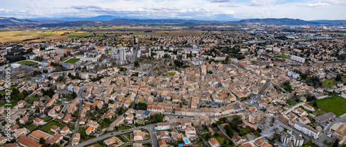 Aerial view around the old town of the city Pierrelatte in France on a cloudy day in early spring.
