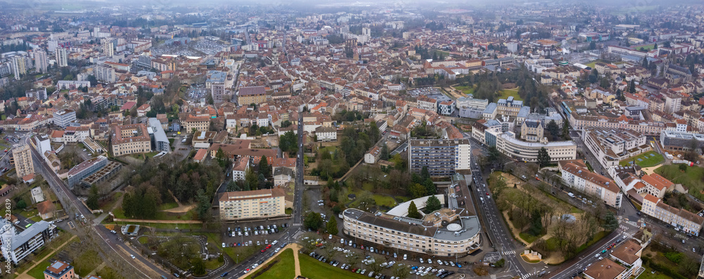 Aerial around the city Bourg-en-Bresse in France on a cloudy afternoon.