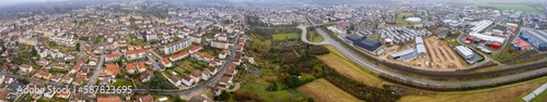 Aerial around the city Bourg-en-Bresse in France on a cloudy afternoon.