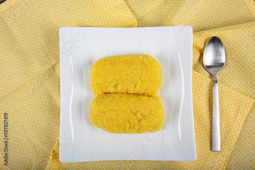 Cheese dessert on a dark background. Traditional Middle Eastern cuisine flavors. Cheese halva. Local name peynir helvası yada peynir tatlısı photo