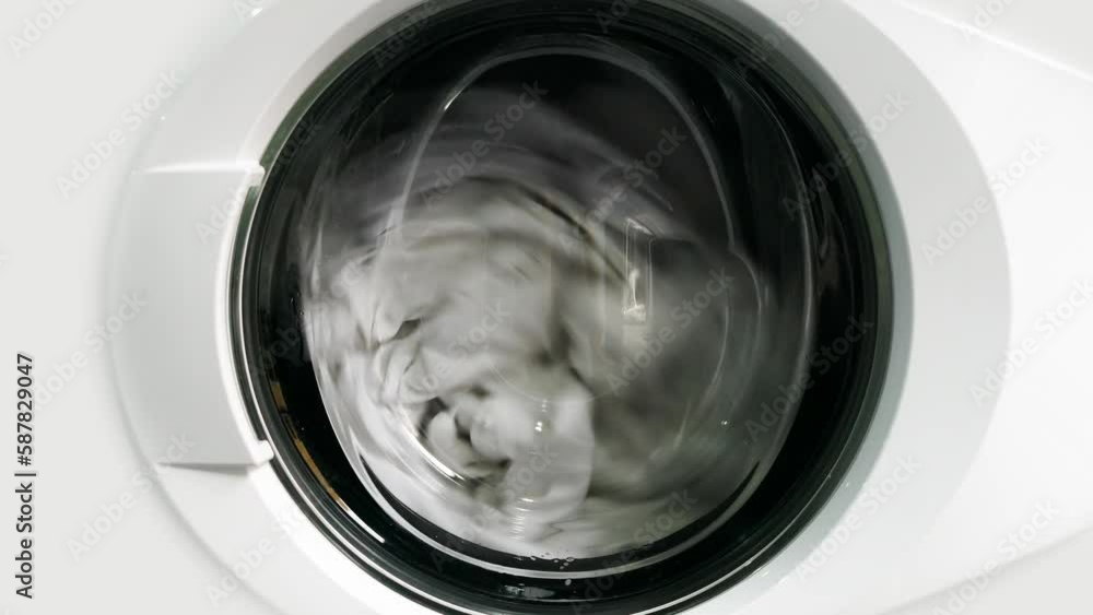 Washing machine washing white clothes Washing machine washing white clothes