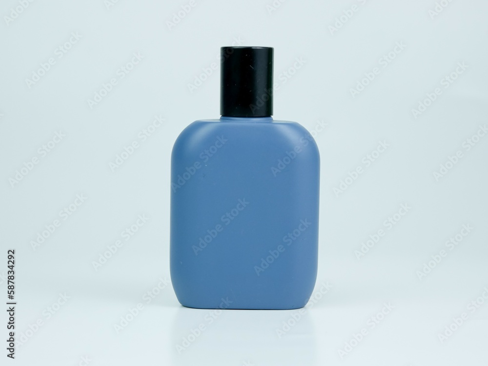 blue perfume bottle mockup with black cap isolated on white blue perfume bottle mockup with black cap isolated on white