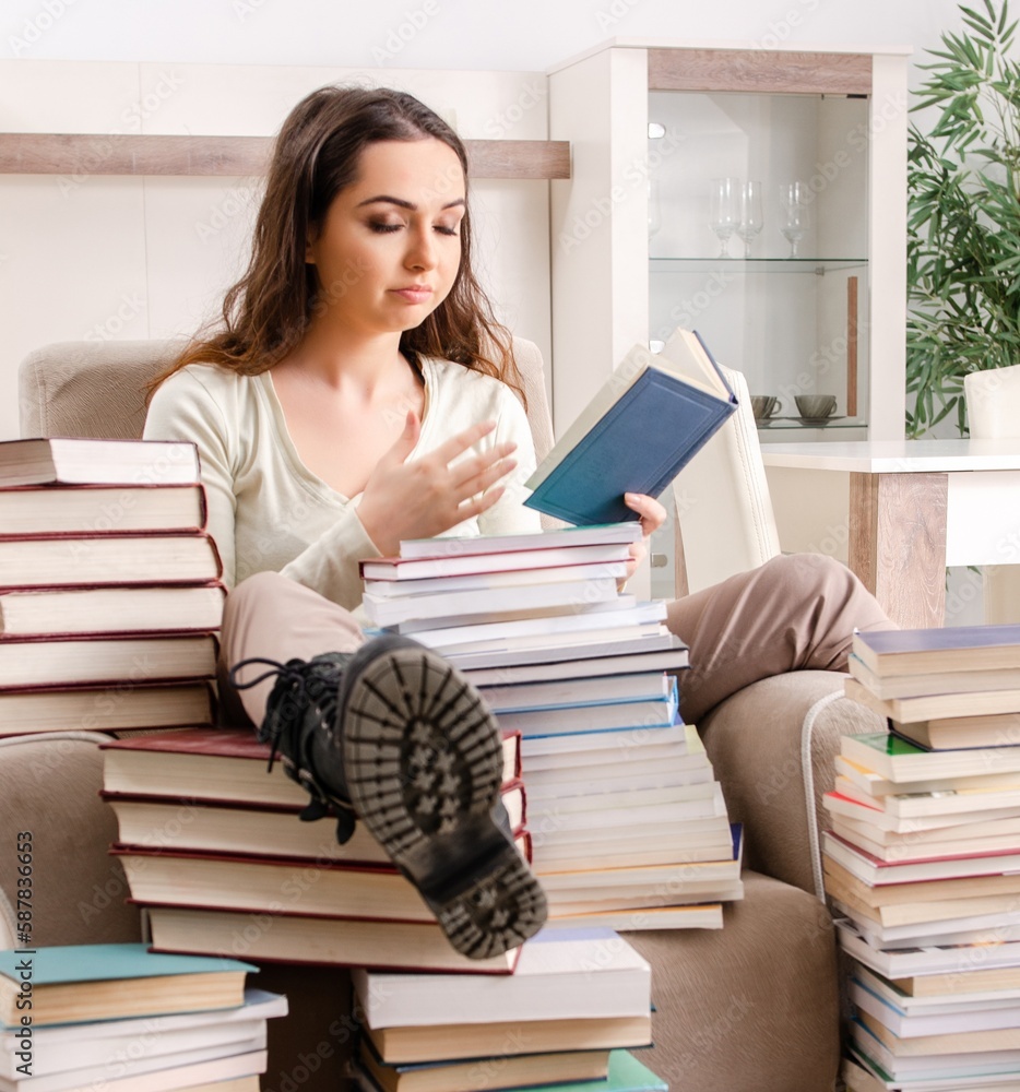 Young female student preparing for exams at home Young female student preparing for exams at home