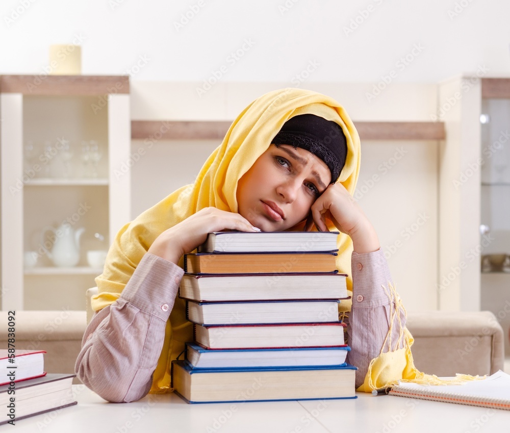 Female student in hijab preparing for exams Female student in hijab preparing for exams
