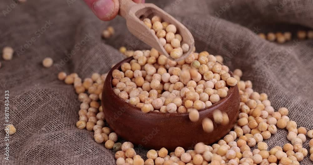 Round yellow peas for cooking porridge, raw yellow peas scattered before cooking Round yellow peas for cooking porridge, raw yellow peas scattered before cooking
