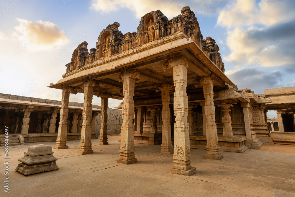 Ancient medieval architecture of the Hazara Rama temple with intricate stone carvings at Hampi, Karnataka India	
