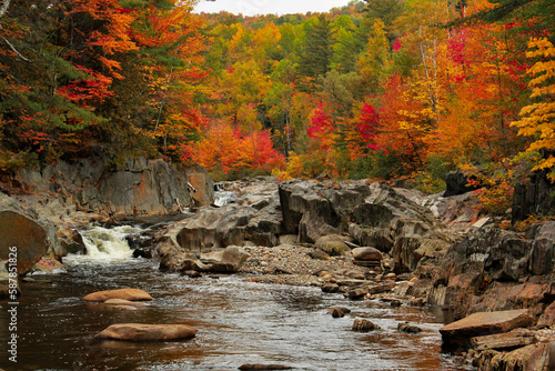 waterfall in autumn forest