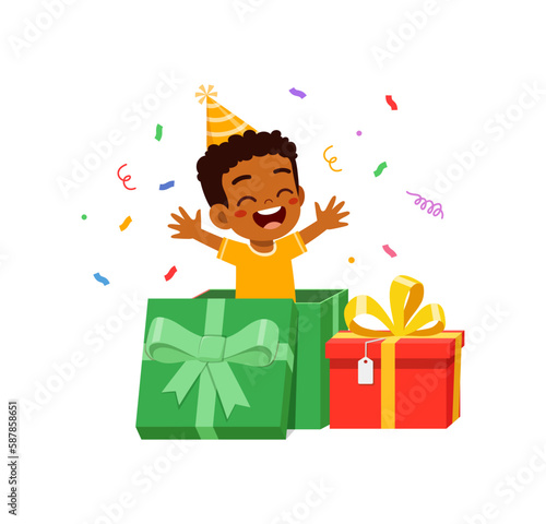 little kid celebrate birthday and playing inside big gift box