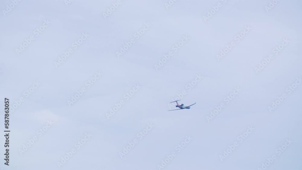 Slow Motion Lockdown Shot Of Airplane Flying In Sky - Washington, District of Columbia Slow Motion Lockdown Shot Of Airplane Flying In Sky - Washington, District of Columbia