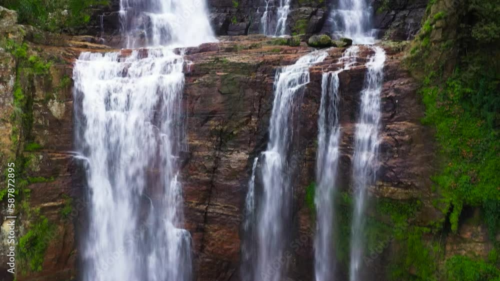 Waterfall in the green forest. Lower Ramboda Falls in the jungle. Sri Lanka. Waterfall in the green forest. Lower Ramboda Falls in the jungle. Sri Lanka.