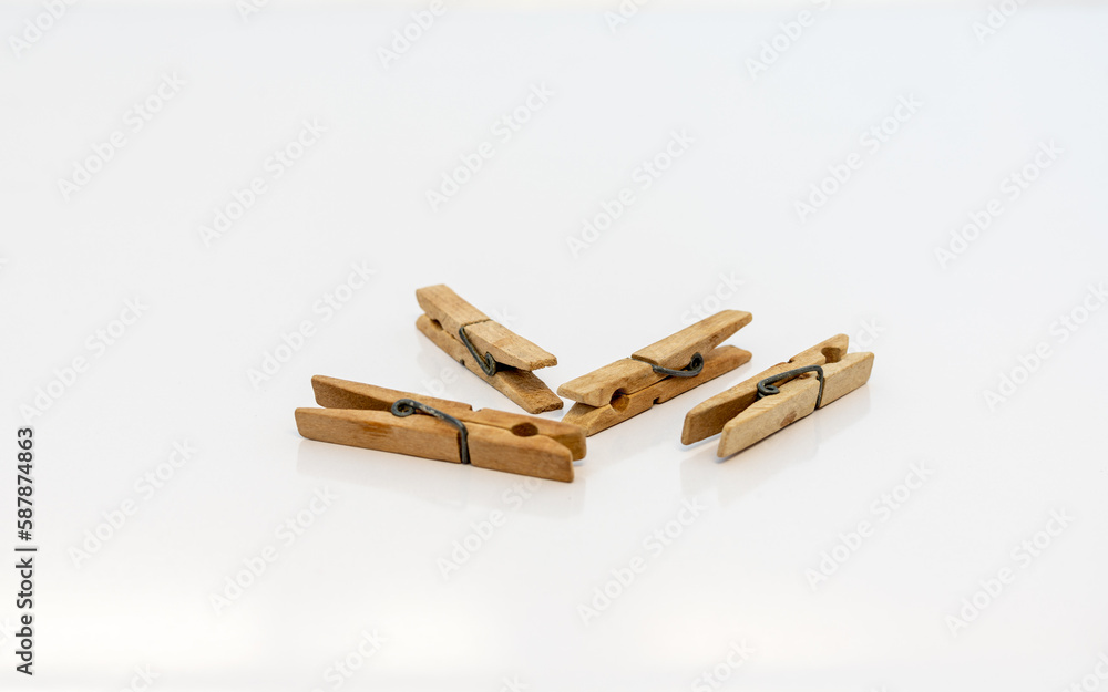 Wooden clothespins on white isolated background Wooden clothespins on white isolated background