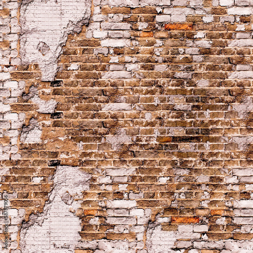 Texture of an old brick wall with remnants of plaster