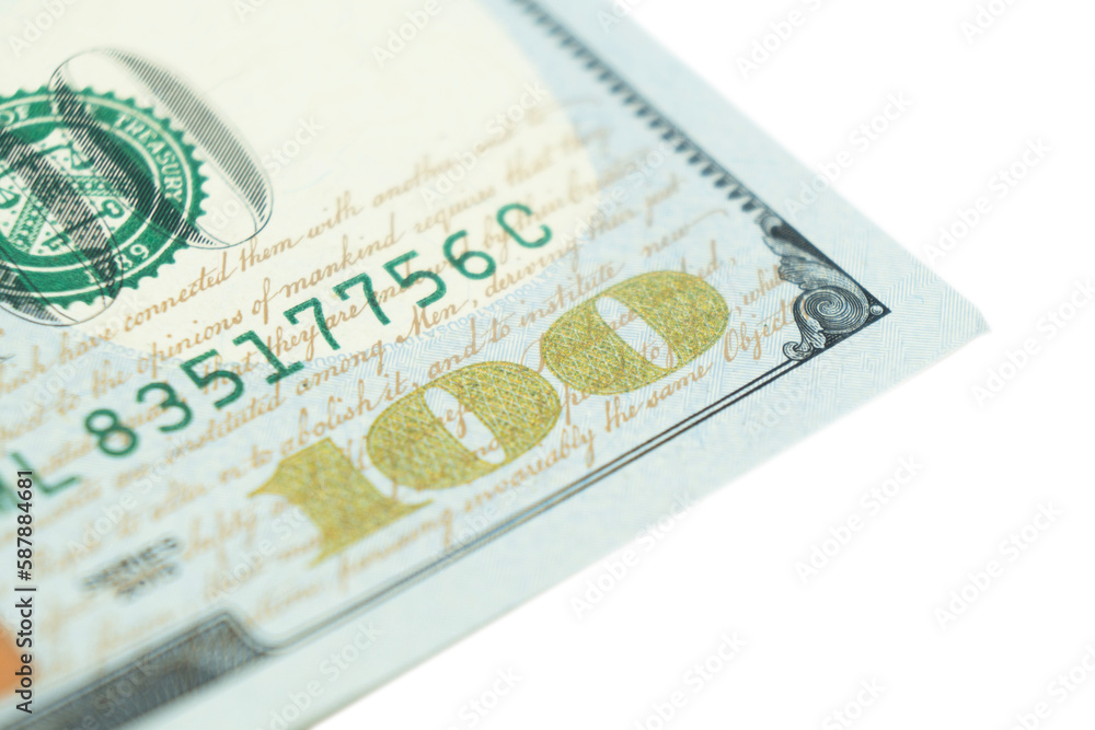 Obraz premium Macro shot image of the corner of a 100 dollar bill banknotes. Concept of financial success. Background of 100 dollar bills. One hundred dollars.