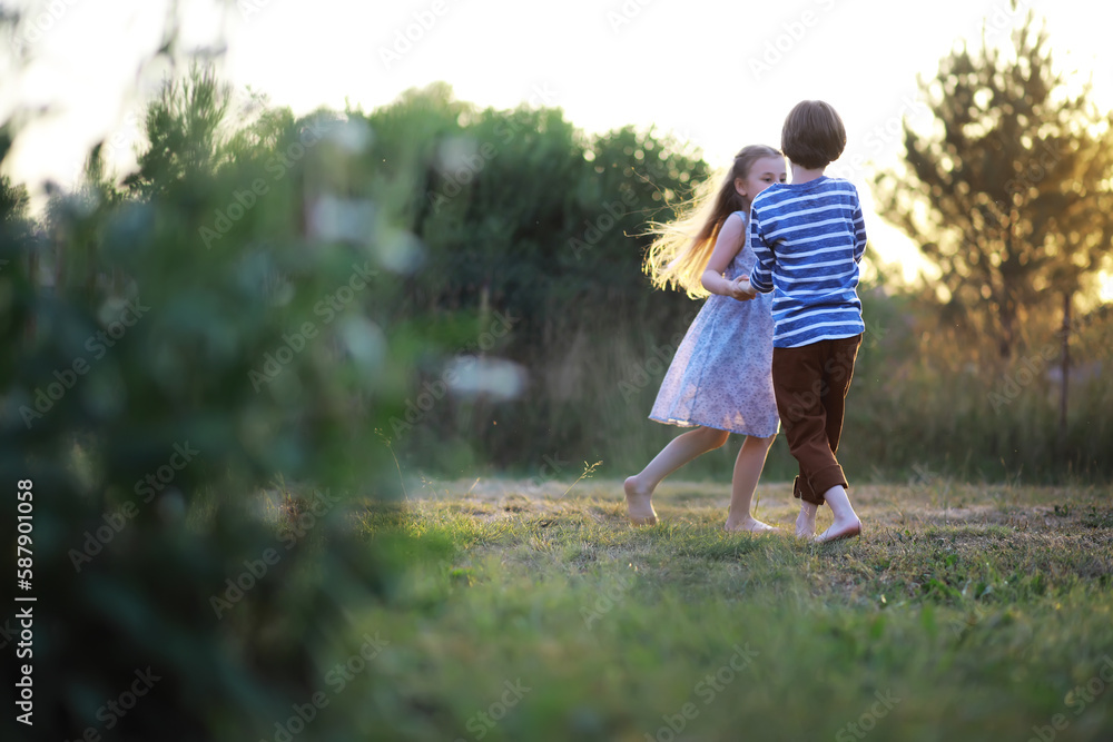 Children walk in the summer in nature. Child on a sunny spring morning in the park. Traveling with children. Children walk in the summer in nature. Child on a sunny spring morning in the park. Traveling with children.
