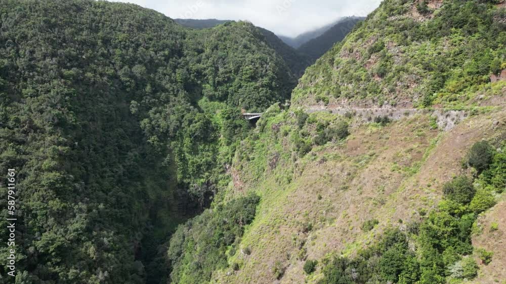 Volcanic green gorge and bridge, one of the main bridges in the northeast of La Palma, Canary Islands, Spain. Volcanic green gorge and bridge, one of the main bridges in the northeast of La Palma, Canary Islands, Spain.
