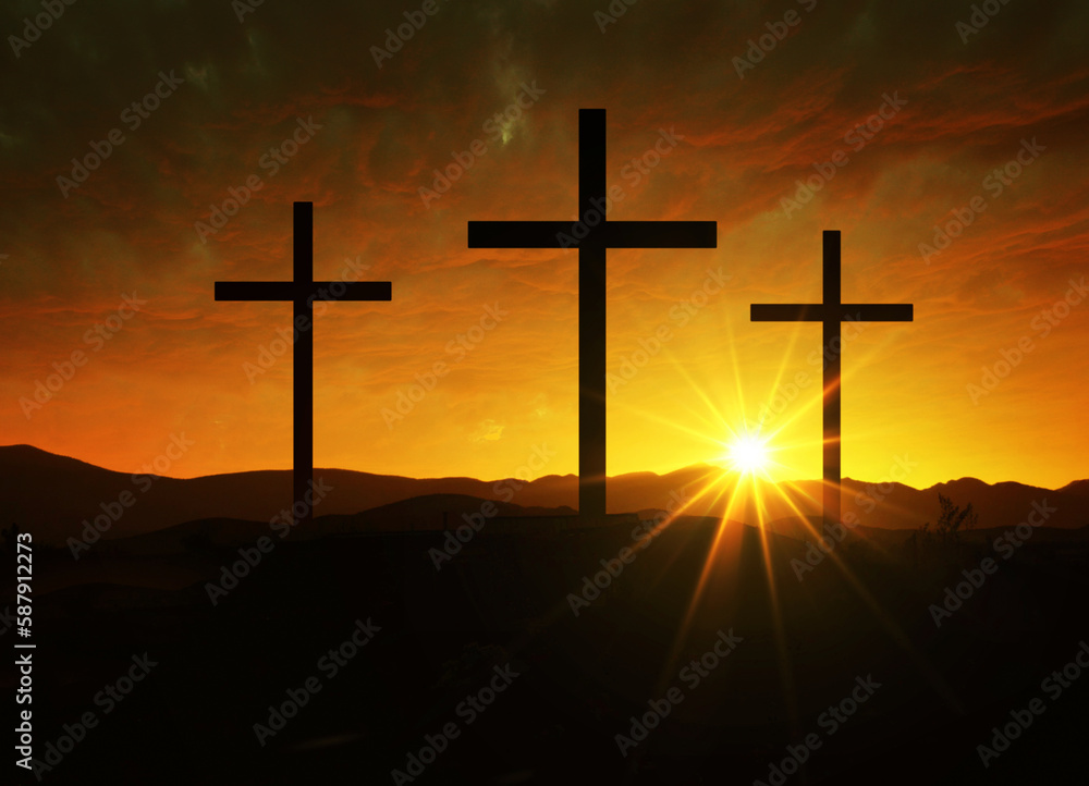 Crucifixion of Jesus Christ at dawn - three crosses on the hill at sunset.