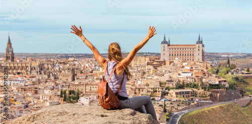 Photos Woman tourist in Toledo city landscape panoramic view in Spain