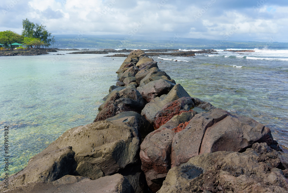 Hawaiian Coast Separated from the Ocean by a Rock Barrier
