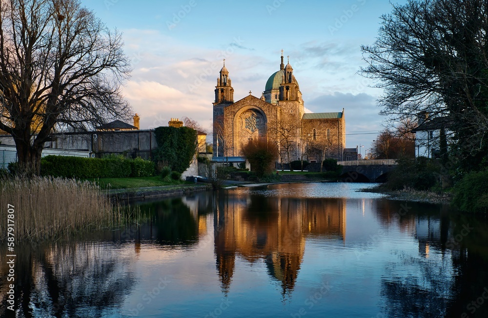 Beautiful scene of irish landmark Galway cathedral reflected in Corrib river at Galway City, Ireland