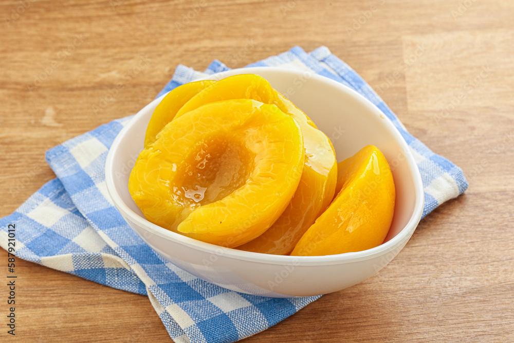 Sweet canned peaches with syrope Sweet canned peaches with syrope