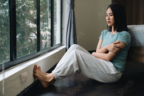 Obraz na plátně Young Asian woman at home
