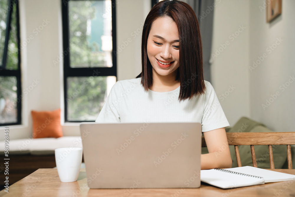 Image of young Asian woman at home Image of young Asian woman at home