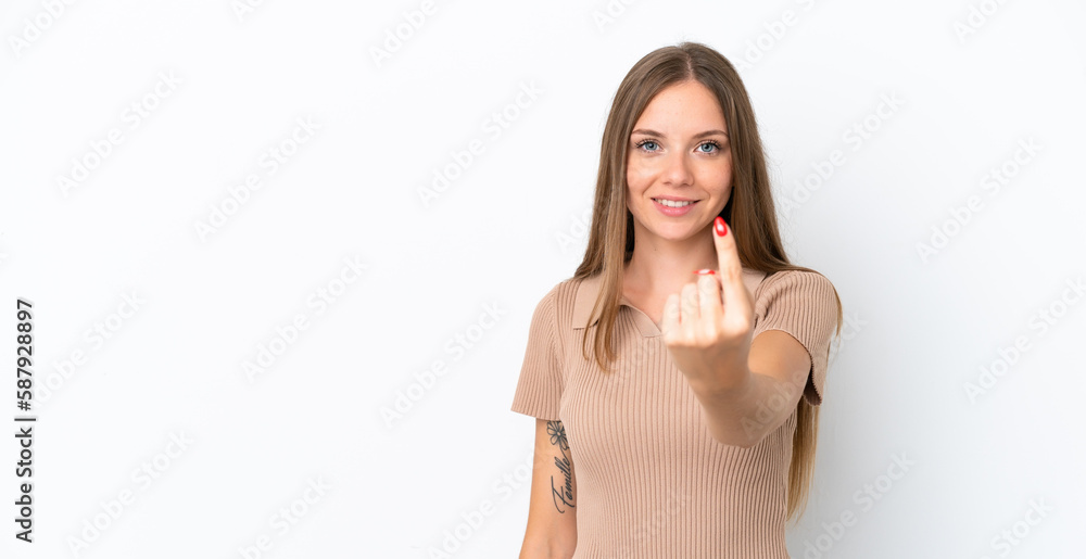 Young Lithuanian woman isolated on white background doing coming gesture Young Lithuanian woman isolated on white background doing coming gesture