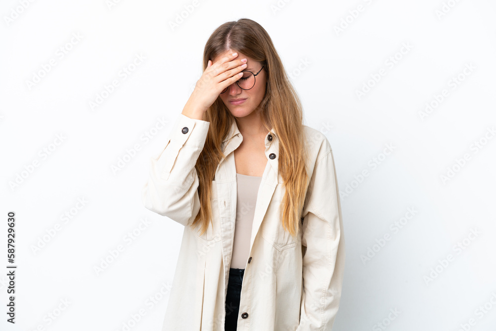 Young blonde woman isolated on white background with headache Young blonde woman isolated on white background with headache