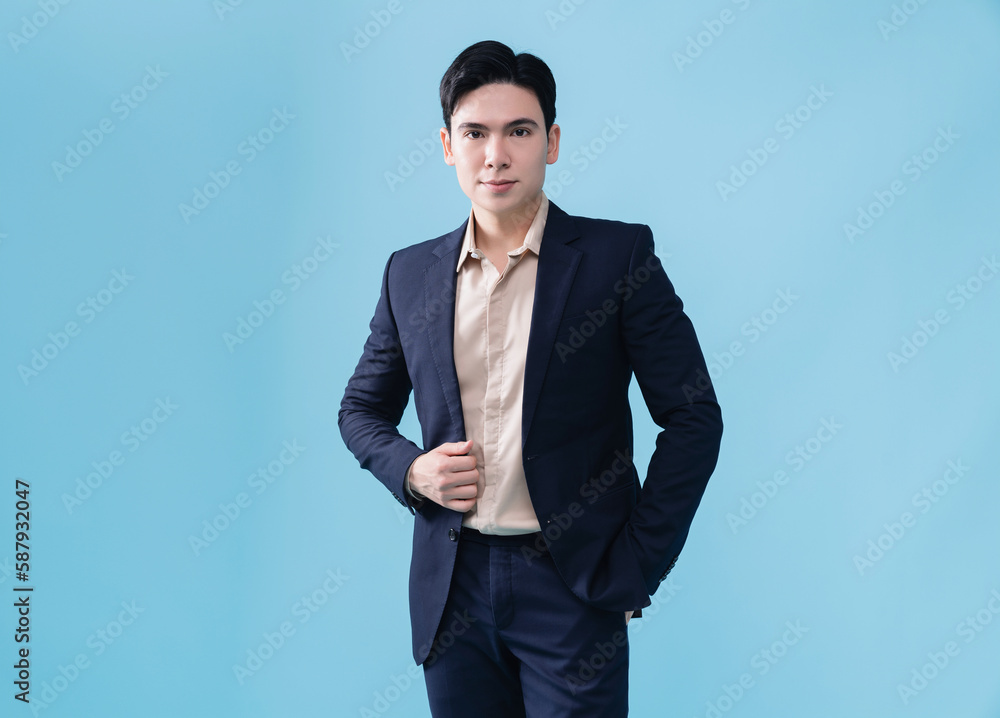Photo of young Asian businessman on background Photo of young Asian businessman on background