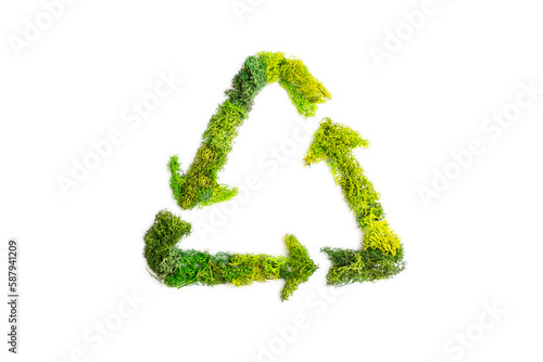 Recycle triangle logo made with green moss isolated on white background