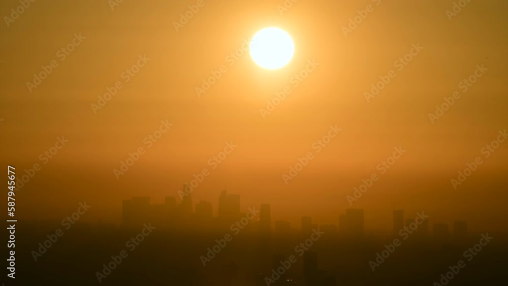 Timelapse Lockdown Of Morning Sunrise Over A Hazy City Skyline - Los Angeles, California Timelapse Lockdown Of Morning Sunrise Over A Hazy City Skyline - Los Angeles, California