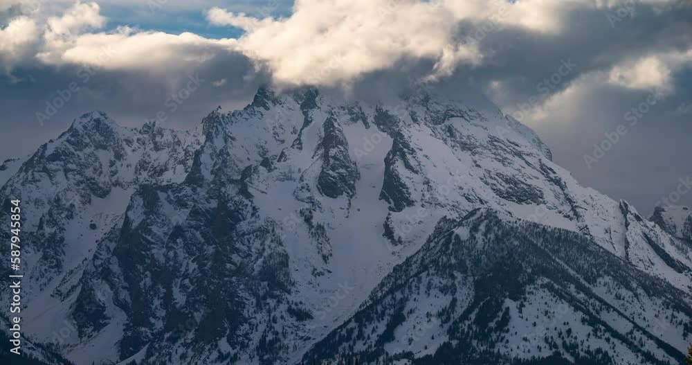 Timelapse Lockdown Of A Wintery Snowcapped Mountain And Passing Clouds - Jackson Hole, Wyoming Timelapse Lockdown Of A Wintery Snowcapped Mountain And Passing Clouds - Jackson Hole, Wyoming