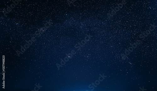 Colourful Night Starry Sky In Blue Colors. Night Dark Blue Sky Glowing Stars Background Backdrop With Sky Gradient. Amazing View Sky. Traces Of Stars.