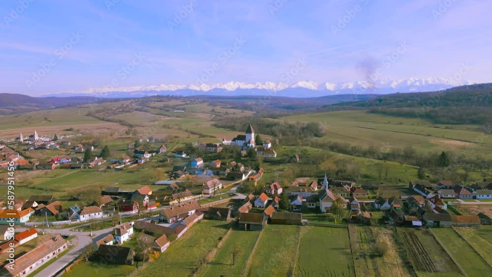 Aerial video of the fortified church located in Hosman village, Sibiu ...