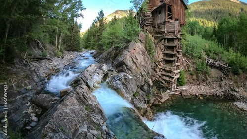 Timelapse Of A River Flowing Past Rocky Terrain And Famous Crystal Mill - Carbondale, Colorado photo