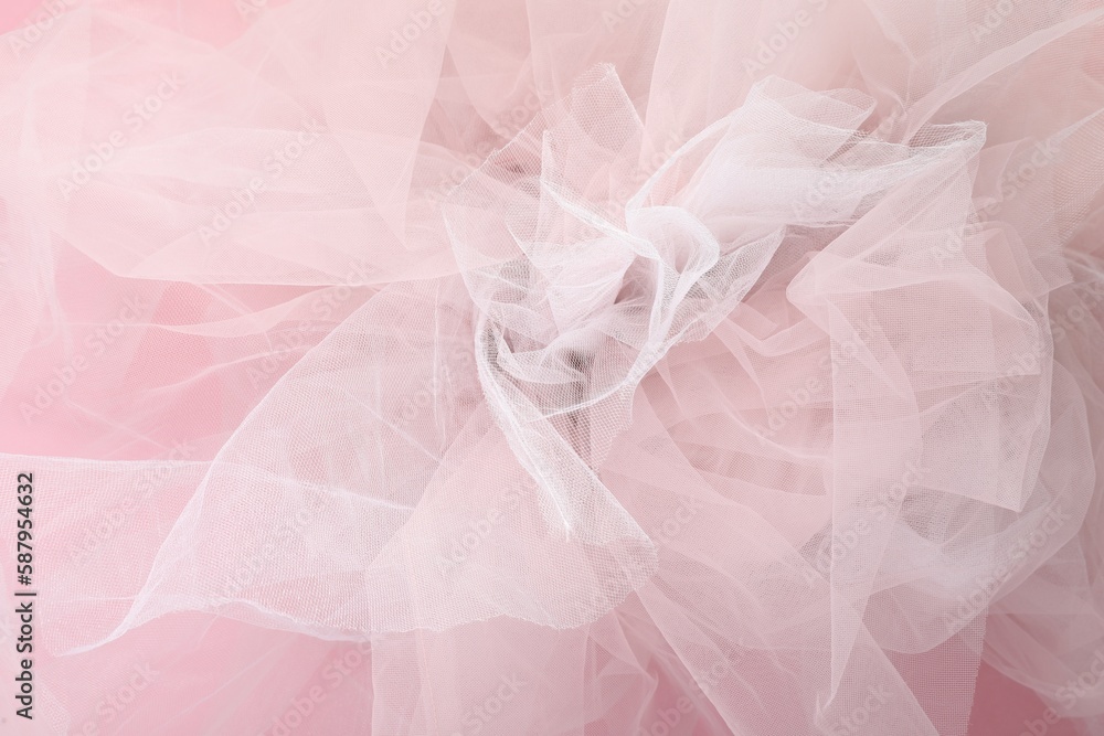 Fototapeta premium Beautiful tulle fabric on pink background, closeup