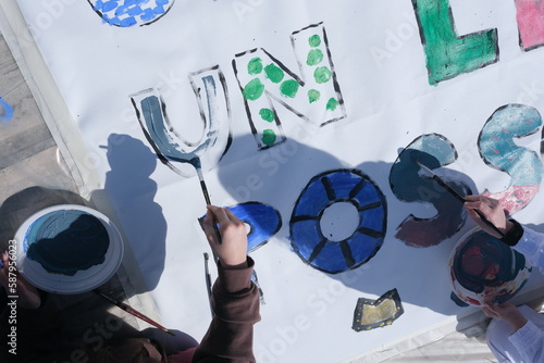 colors and paintbrushes for a better world