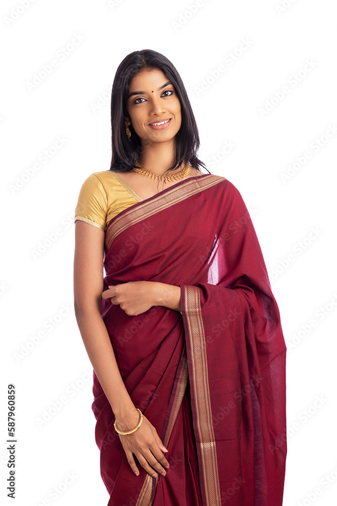 Pretty Indian young girl dress up saree on white.